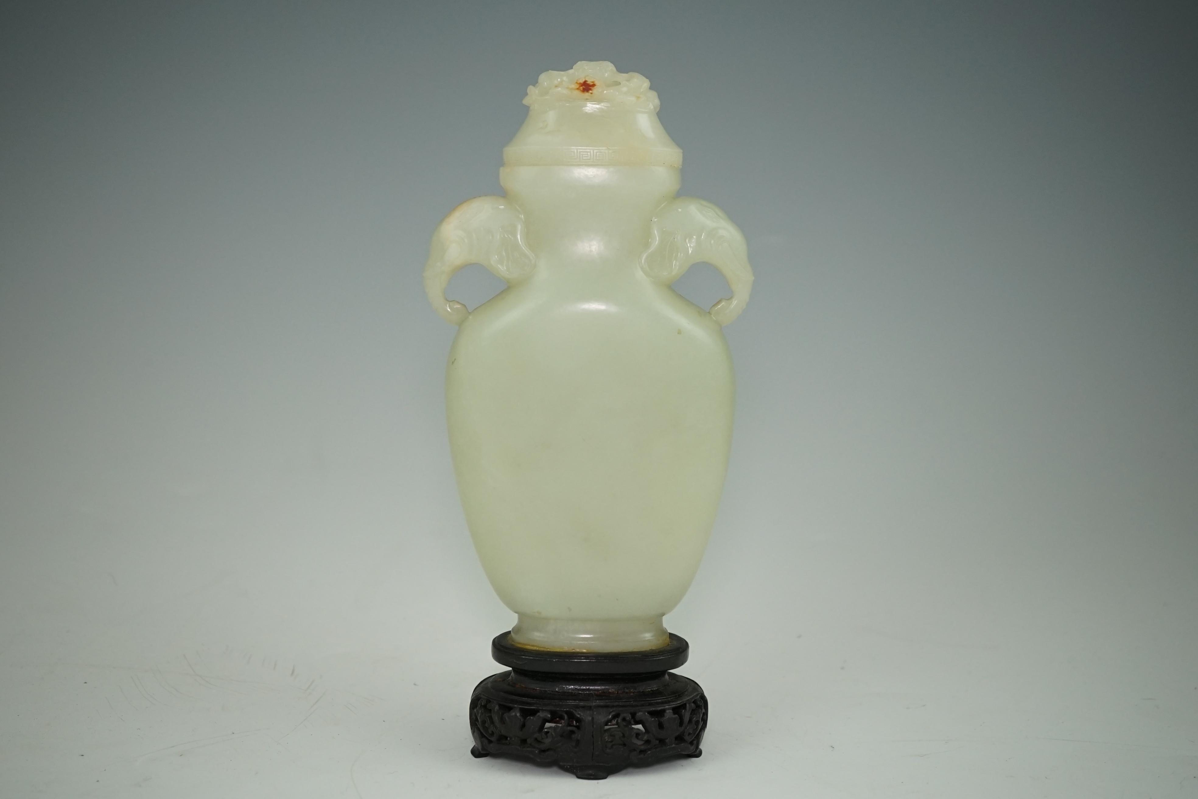 A Chinese pale celadon jade flask-form vase and cover, Qianlong/Jiaqing period, c.1780-1820